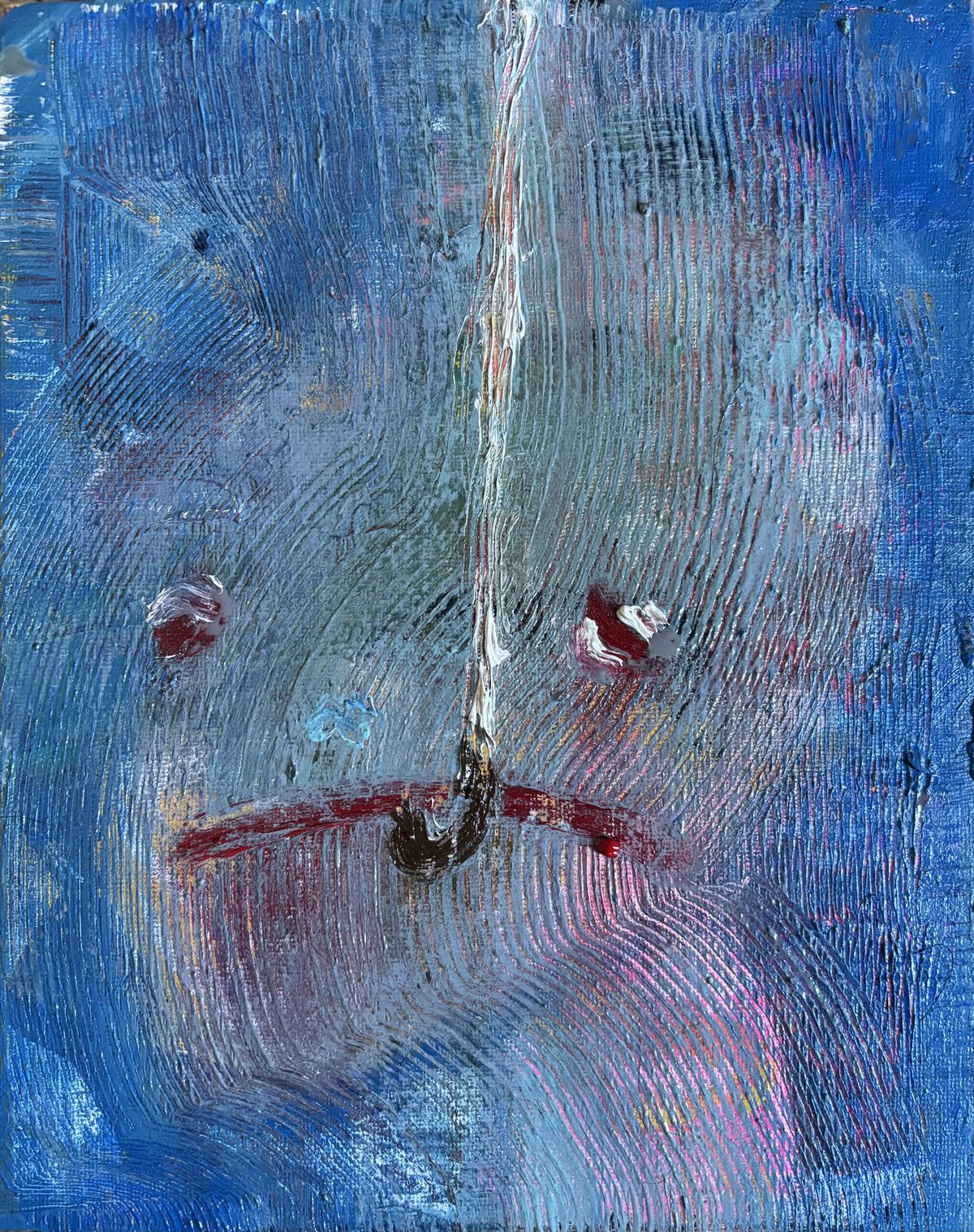 Faces (Sharkbait) - A blue, shark-like or mask-like face fills the frame with small red eyes and a vertical central mark.