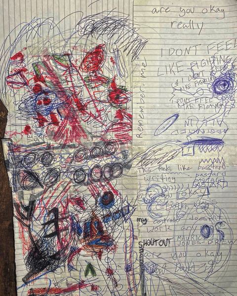 Bastard Writing - A ruled notebook page is filled with red and blue scribbles, faces, circles, arrows, and handwritten phrases.