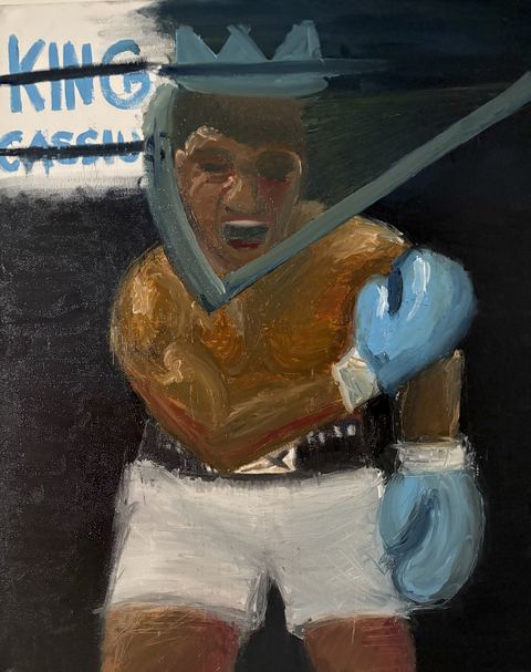 Prince Ali - KING CASSIUS — struck-through blue text over the young prince in headgear and blue gloves, before the name changed.