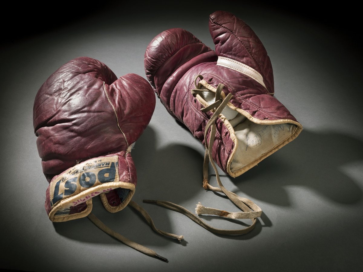 Training gloves signed by Cassius Clay, 1960