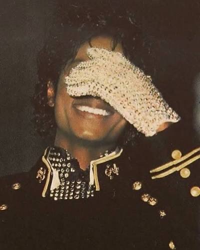 Michael Jackson with white rhinestone glove